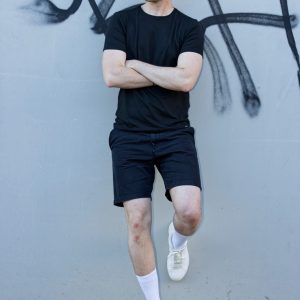 not a horse - Unisex T-Shirt model wall leaning