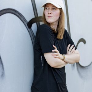 not a horse - Unisex T-Shirt model wall leaning side